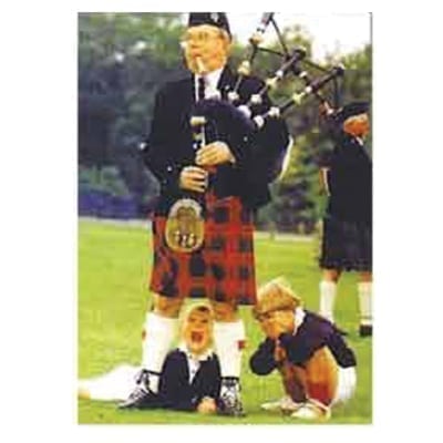 Two children looking under pipers kilt